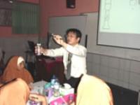 Affiliated high school teachers lead a class at an Indonesian high school